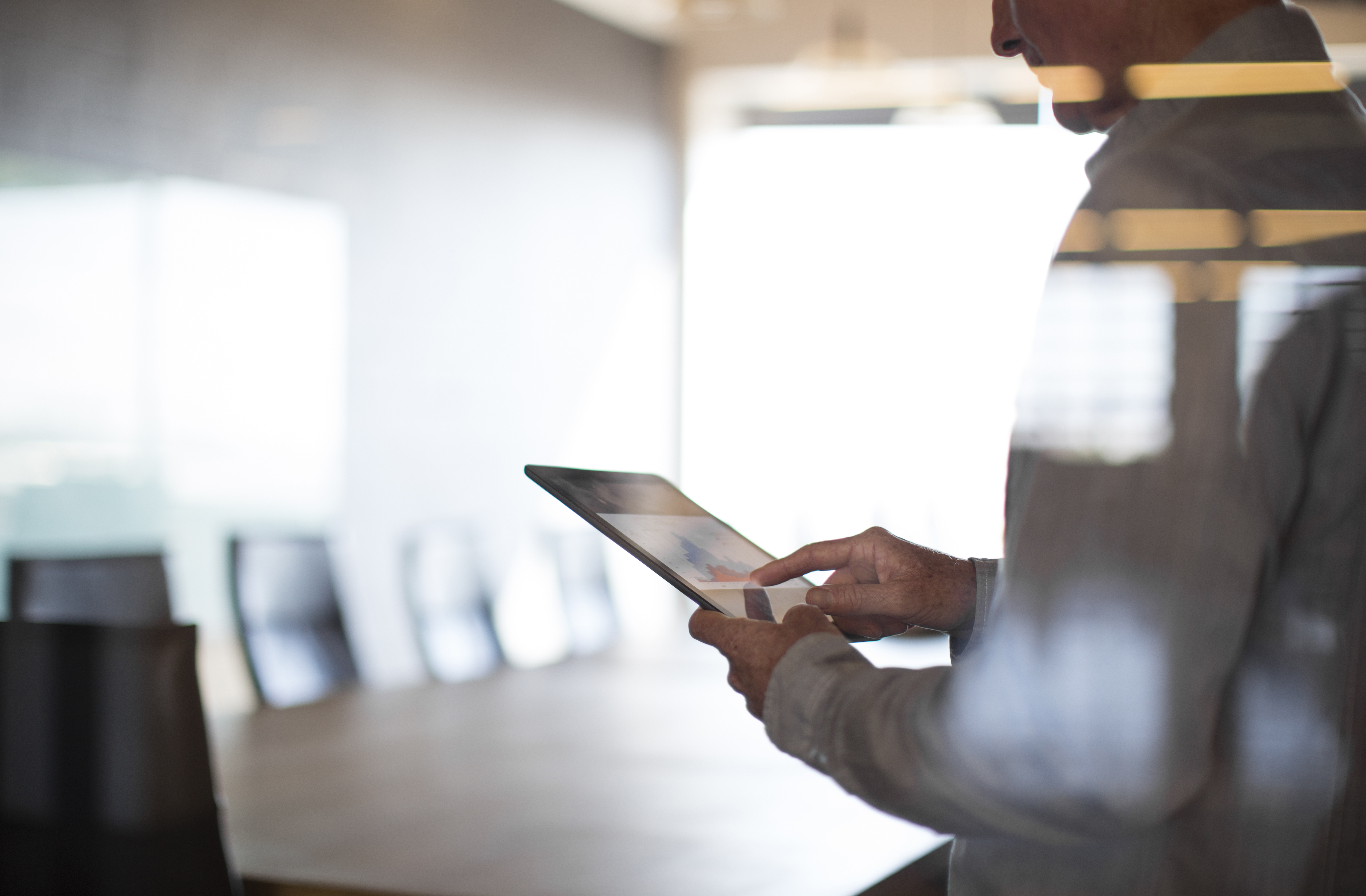 Person using tablet in business setting