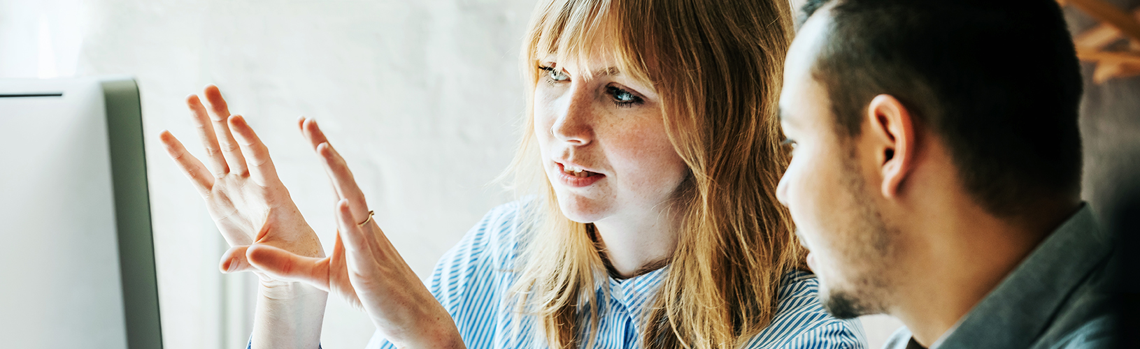 Colleagues discussing erm reporting