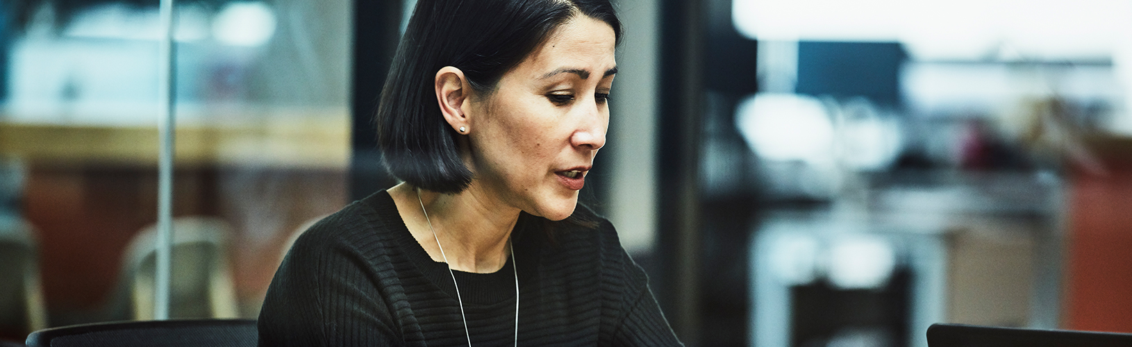 woman reading about corporate governance trends in Asia