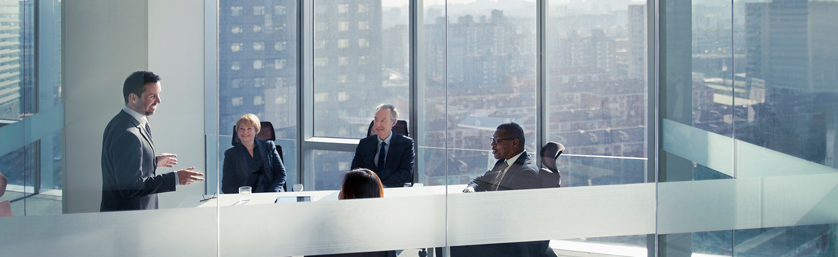 Business people discussing overseeing artificial intelligence
