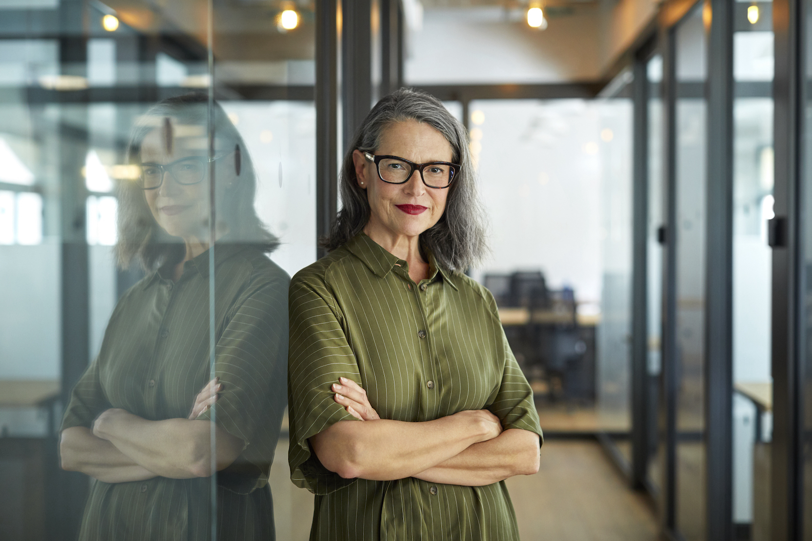 Woman smiling in business setting