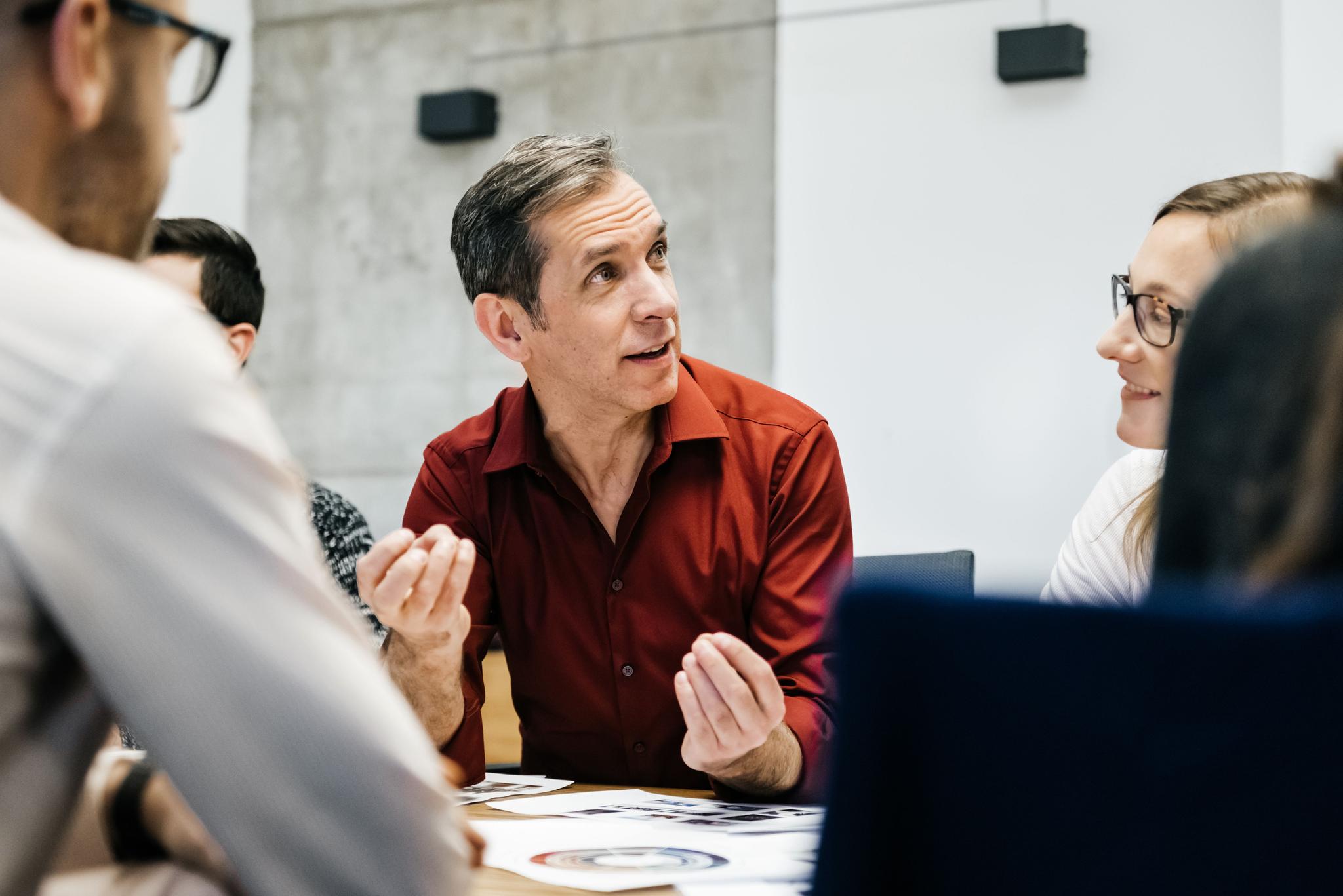 Internal auditors discussing Global Internal Audit Standards™ Topical Requirements