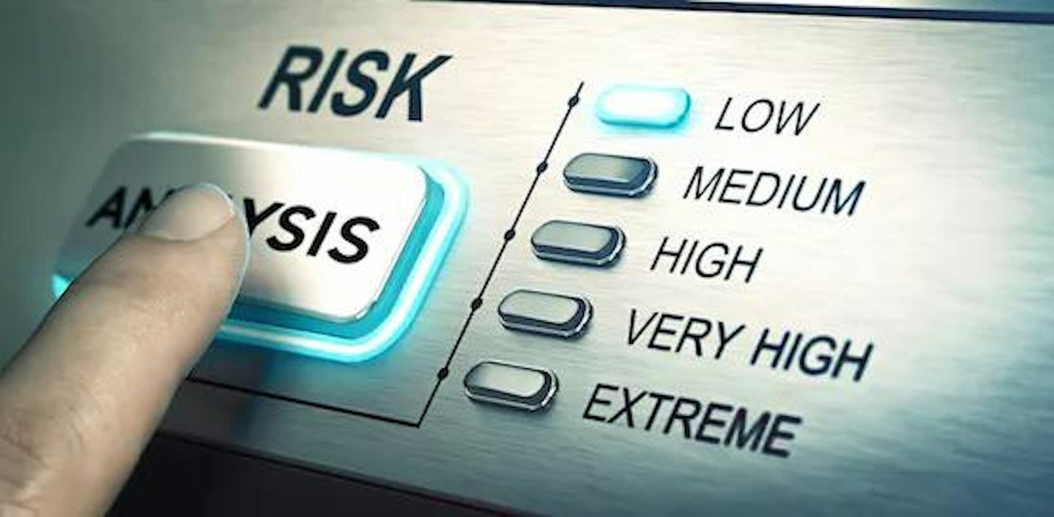 A person pressing an 'analysis' button to signify the annual risk assessment process.
