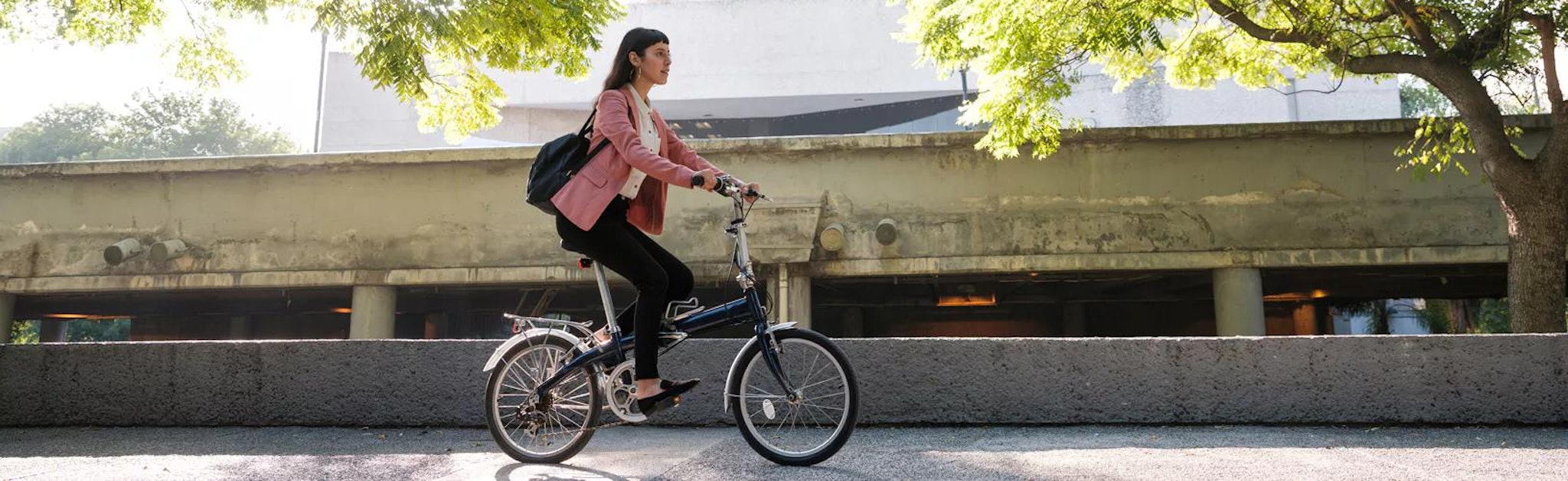 employee practicing sustainability by biking to work