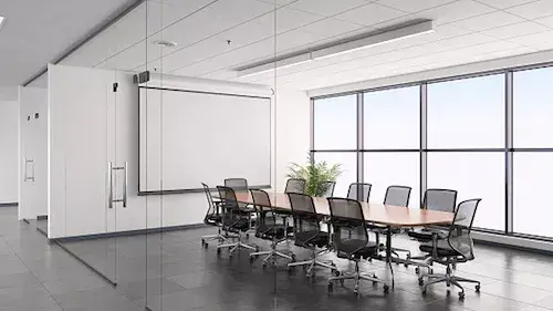 Una imagen de una sala de juntas donde un secretario corporativo realiza muchas de sus funciones.