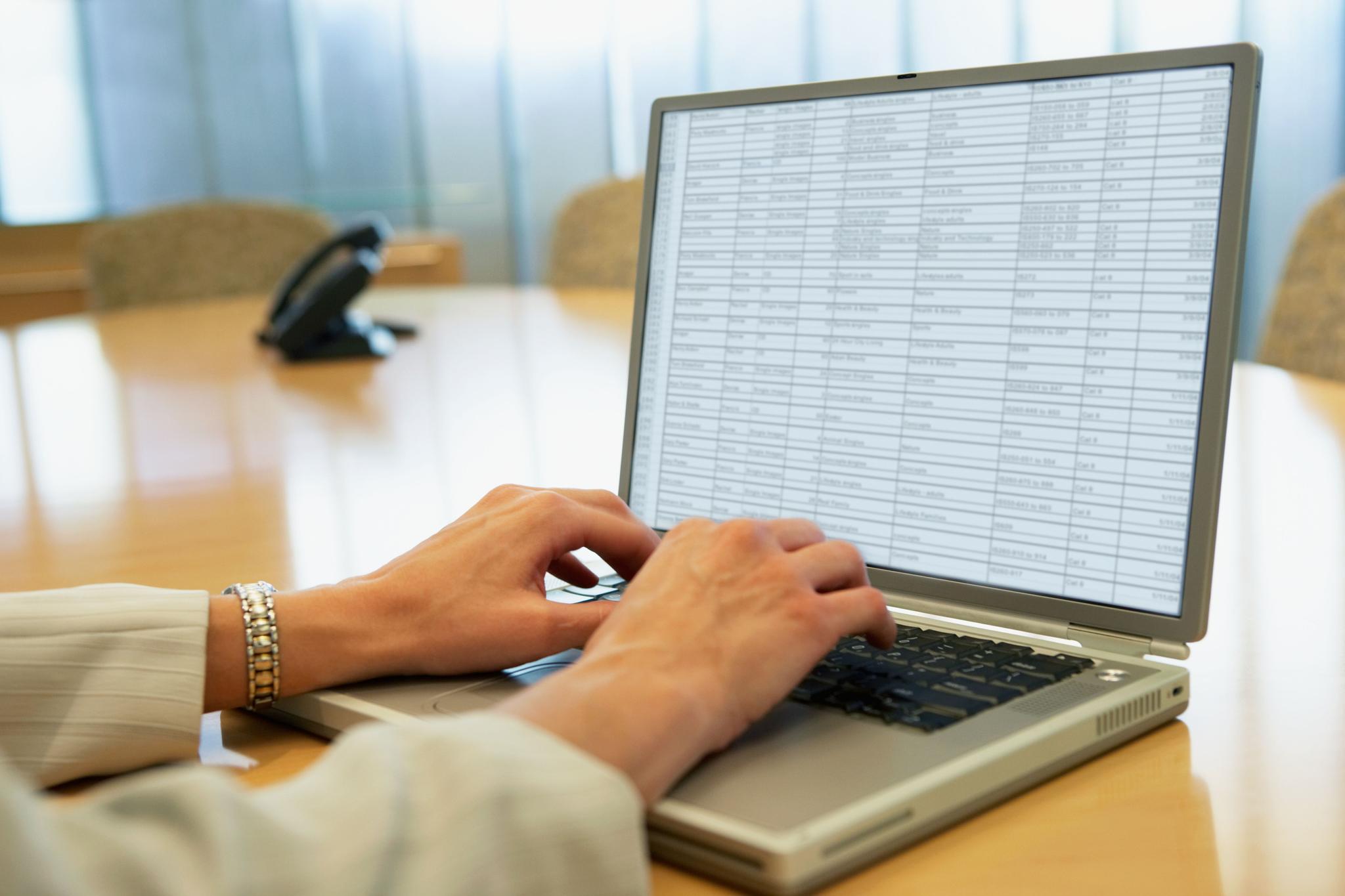 Businesswoman using laptop