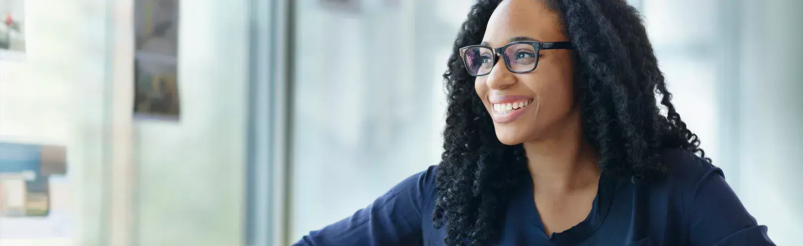 woman reading about LGBTQ+ representation on boards