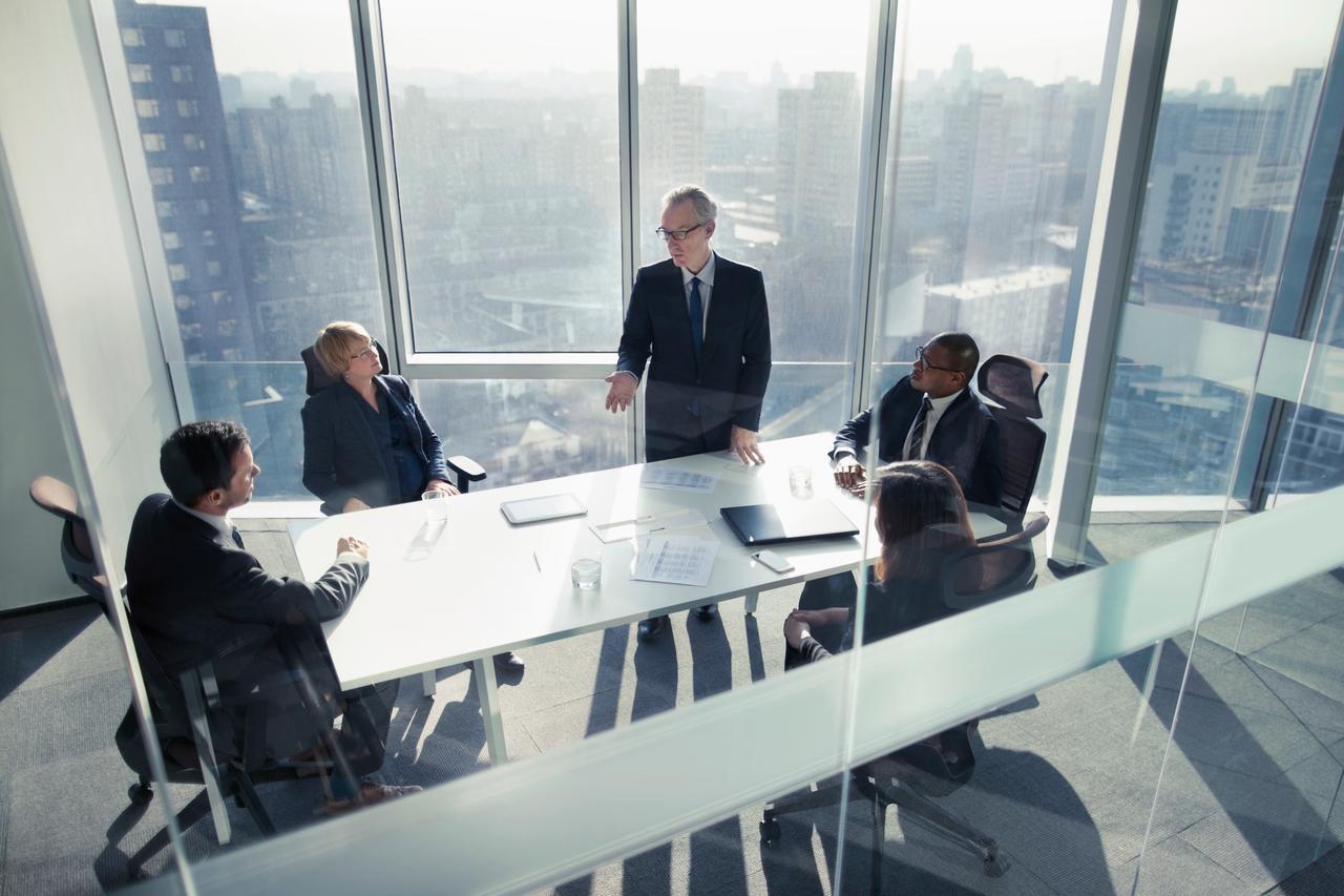 Directors discussing compliance