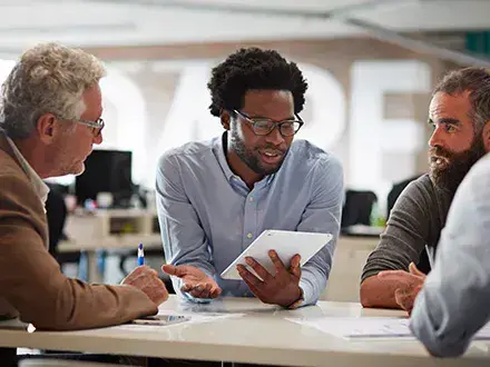 Colleagues preparing for an assurance reporting review