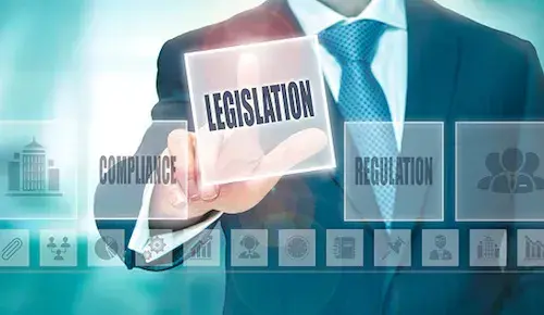 Professional selecting the word "legislation" from hologram