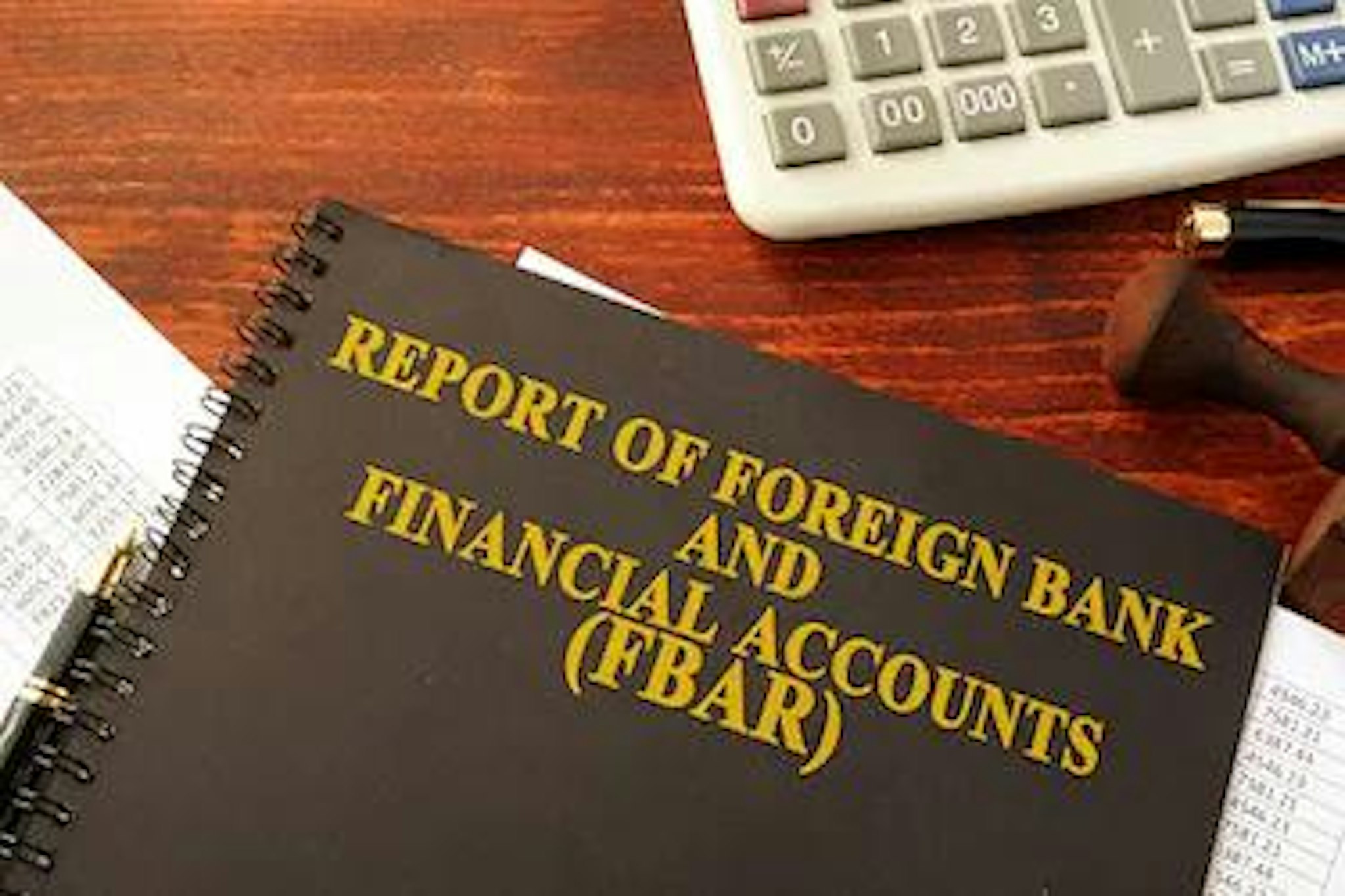 Printed report in binder reading "report of foreign bank and financial accounts (FBAR)"