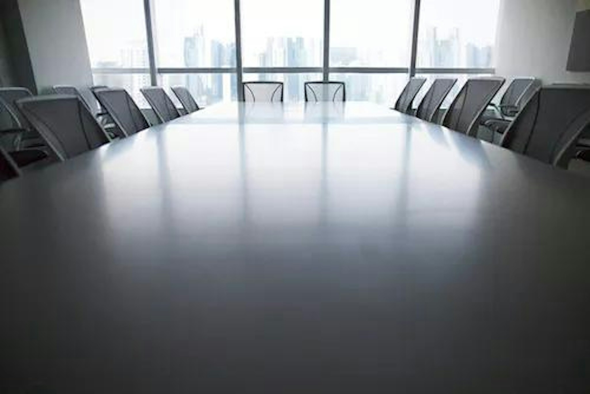 Image of a boardroom signifying choosing the right chair for your board.