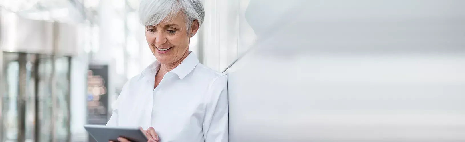 Woman reading tablet with advise for internal auditors