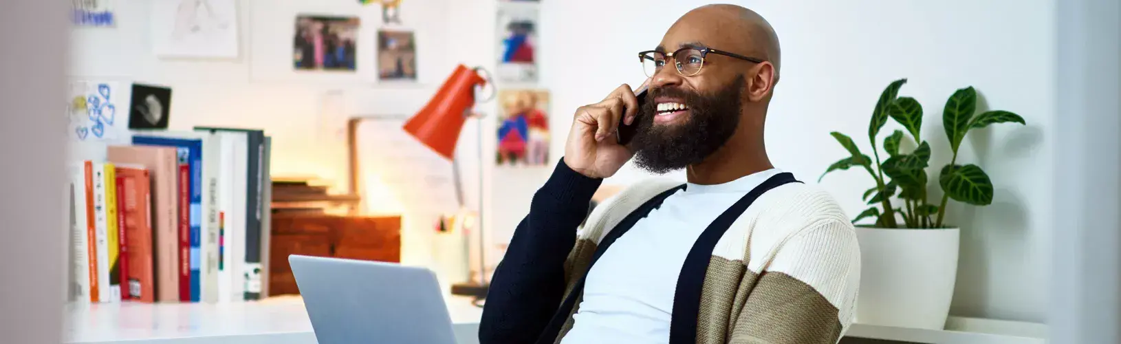 Man in home office engages in remote new member orientation