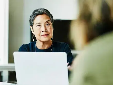 A board member considering the importance of gender diversity in the boardroom.