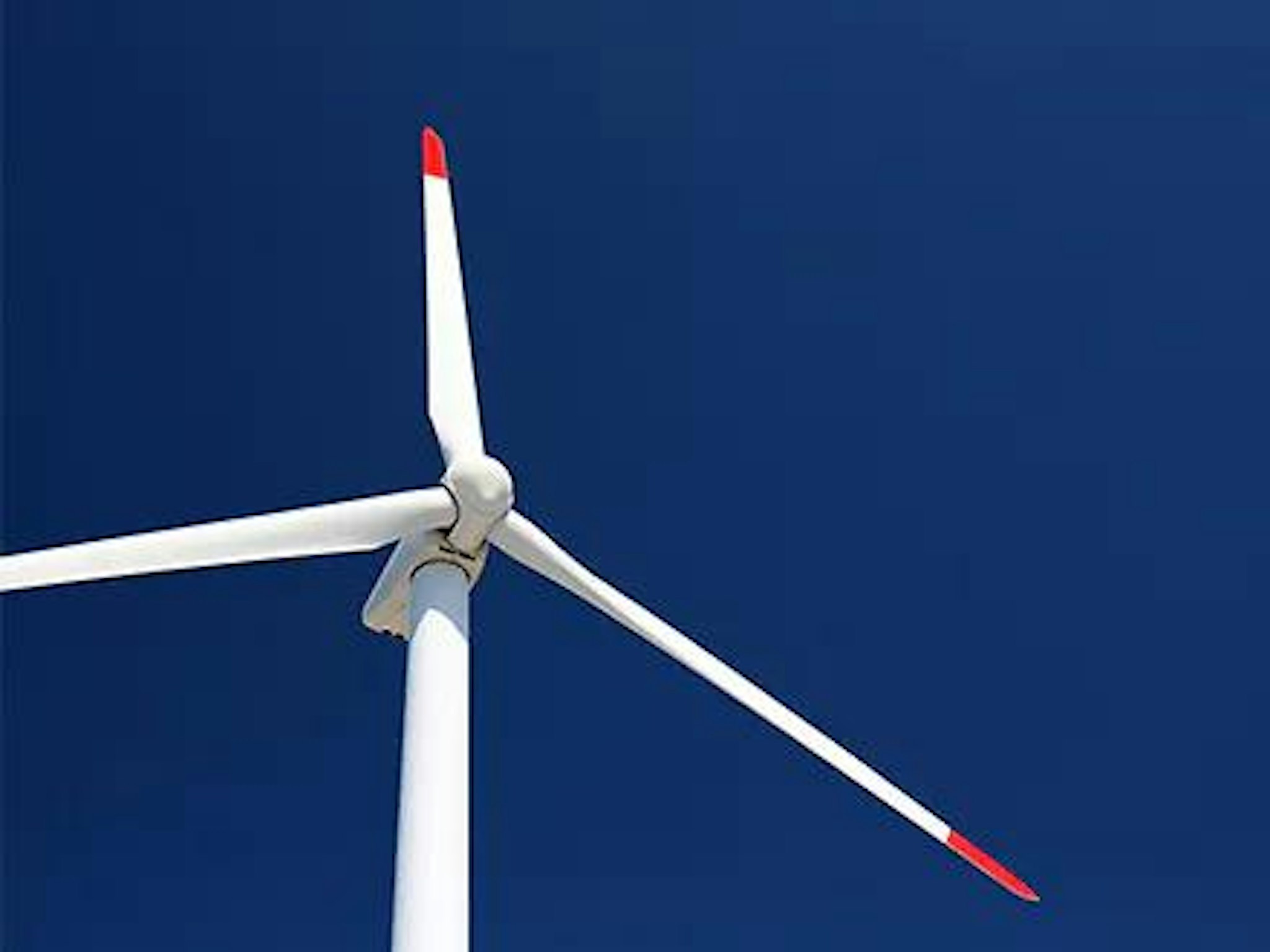 A windmill signifying how your corporate footprint relates to the impact your organization has on the environment. It is sometimes termed a company carbon footprint, environmental footprint, ecological footprint or business footprint, although there are subtle differences between them.