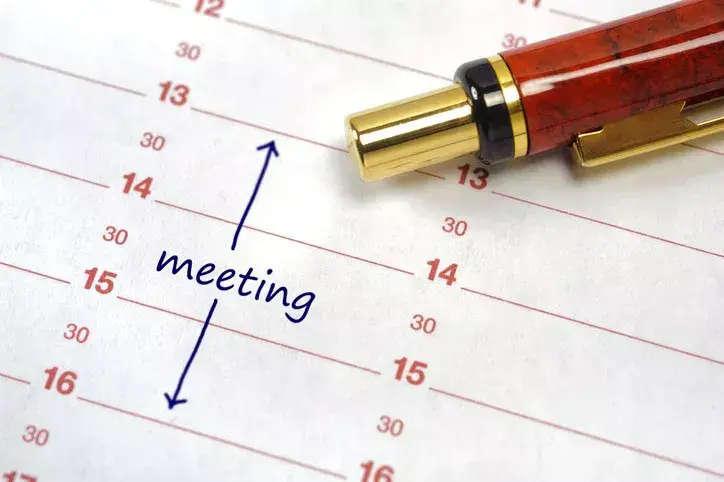 An agenda planner showing the time of a school board's first meeting.