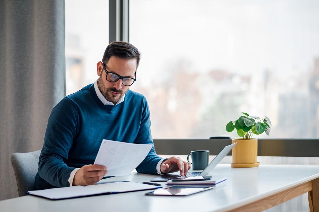 A corporate secretary using a document repository