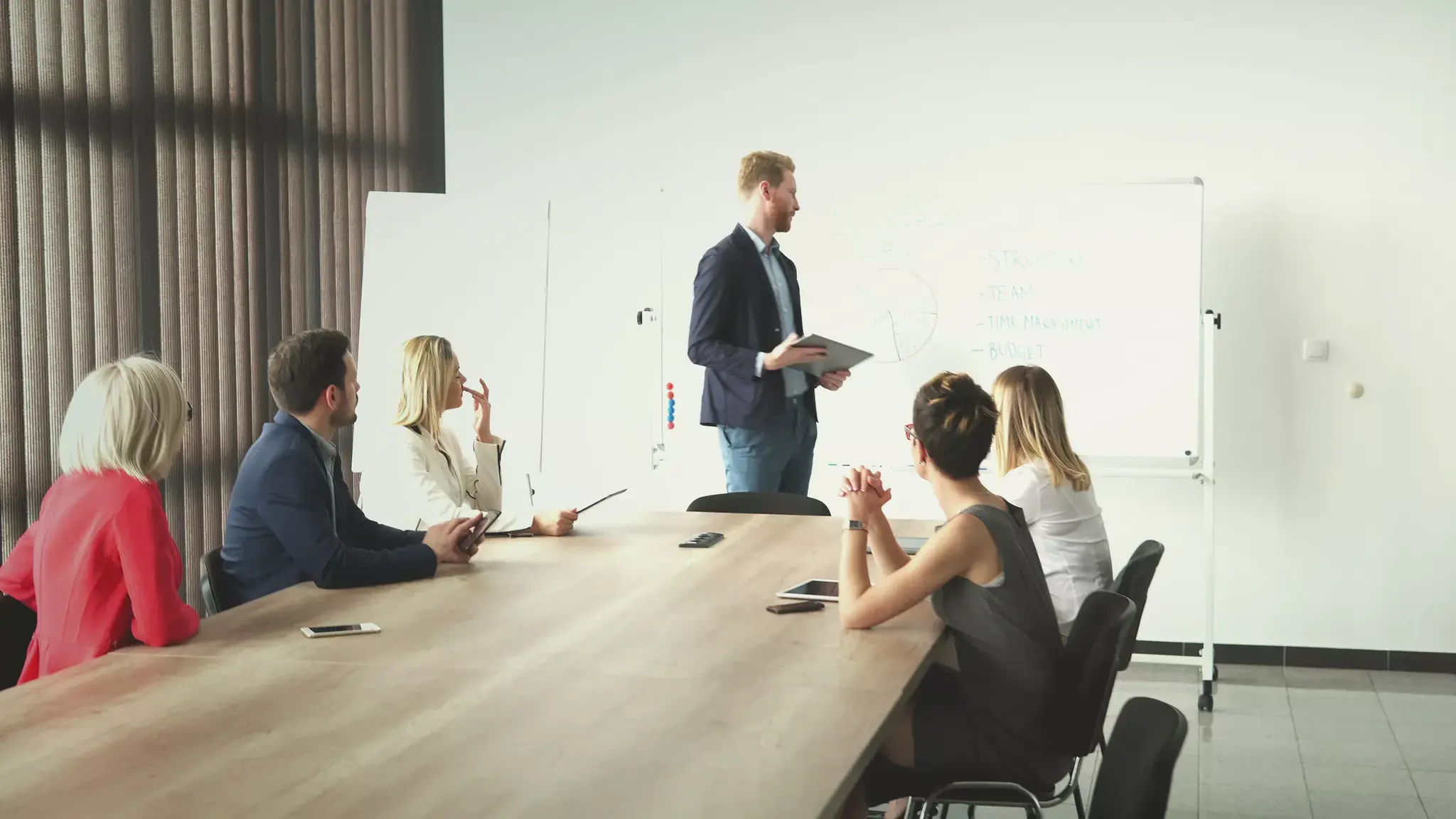 Chairman of board running a meeting