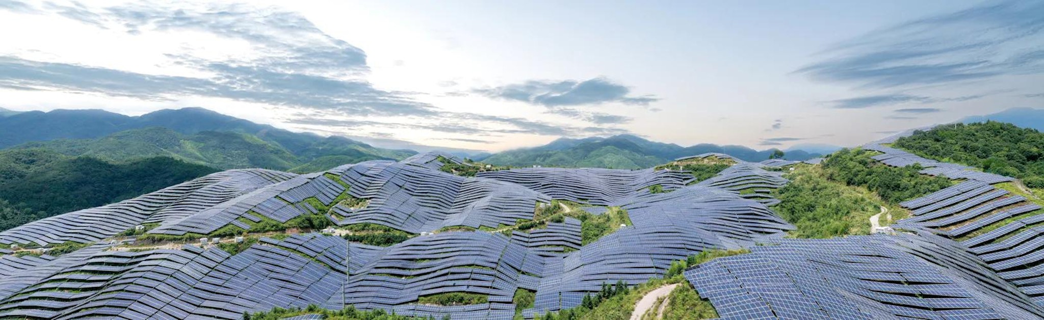 A field of solar panels signifying the importance of ESG technology.