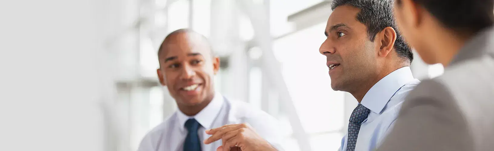 Compliance team discussing Australia’s new workplace harassment regulations
