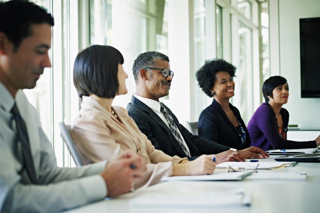 Members of the executive board holding a meeting