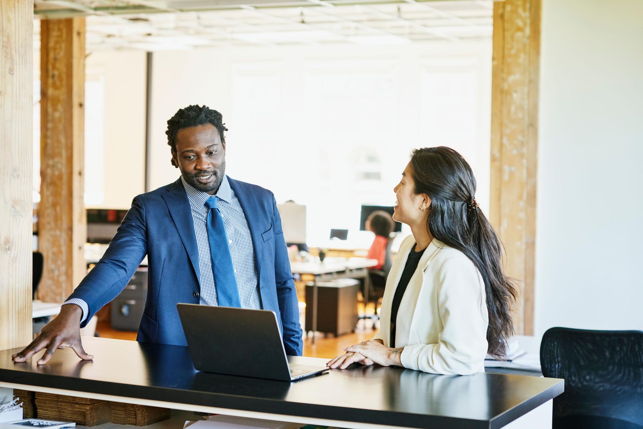 Two professional discussing the evolving investor relations landscape