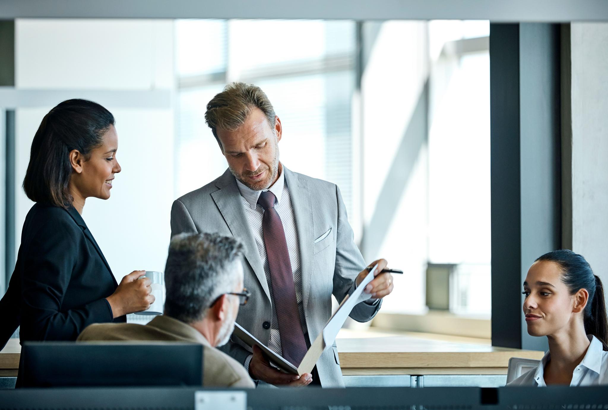 Professionals discussing the latest updates to the UK Corporate Governance Code